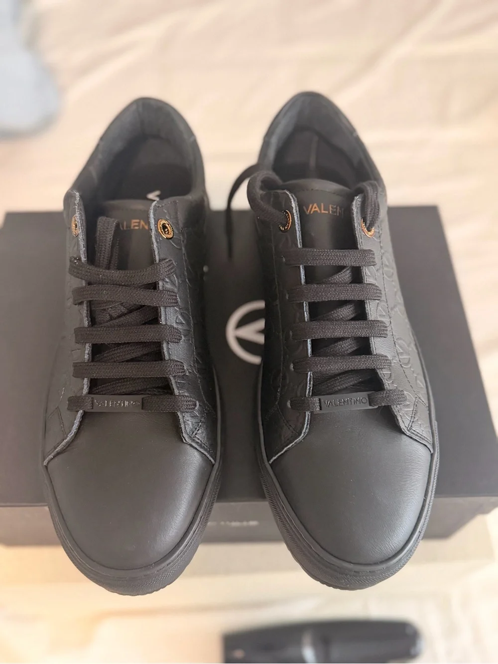 Valentino Men’s Black Leather Low-Top Sneakers with Gold Eyelets